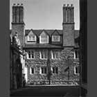 monochrome photo of Trinity College side wall on Trinity Lane