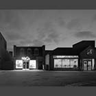 black and white photo of shops beside the Market Square in St Neots at dusk